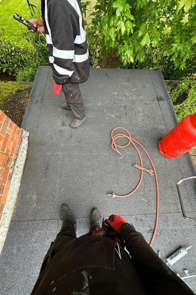 Flat roof being repaired in Chester